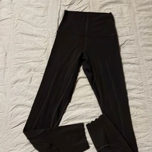 Lululemon Black GRANITE LEGGINGS. Worn once. Scalloped bottoms!
